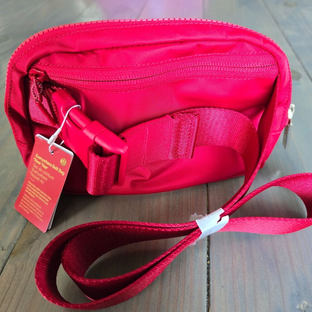 Lululemon everywhere belt bag lunar new year red with gold zipper and logo NWT